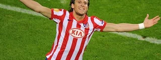 Forlan con la equipación del atlético de madrid 2009