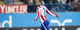 griezmann celebrando un gol con la camiseta atletico de madrid 2014