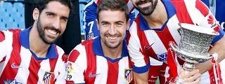 jugadores celebrando con la equipación del atletico de madrid 2014