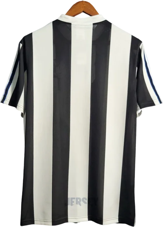 Camiseta New Castle 1997 99 local reverso