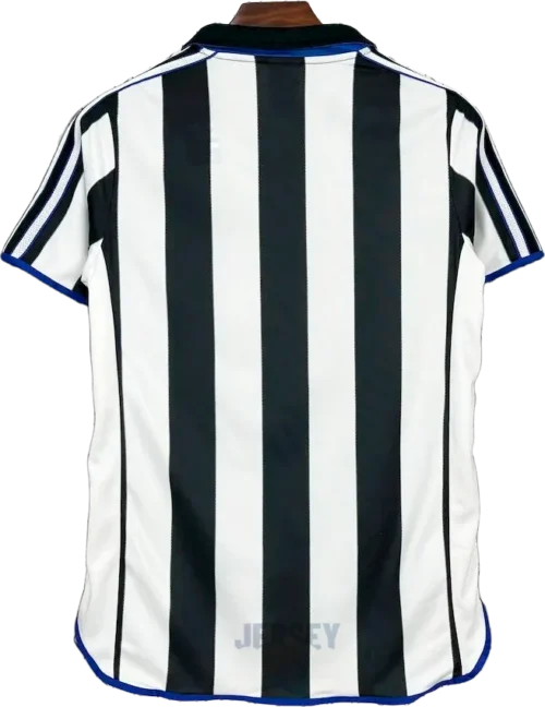 Camiseta New Castle 1999 00 local reverso