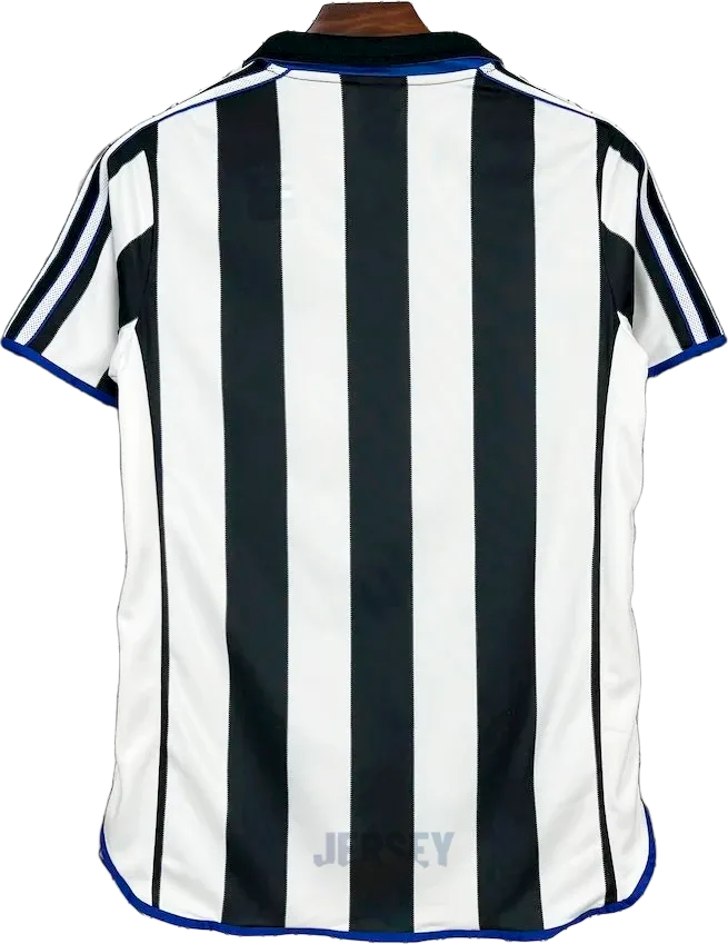 Camiseta New Castle 1999 00 local reverso